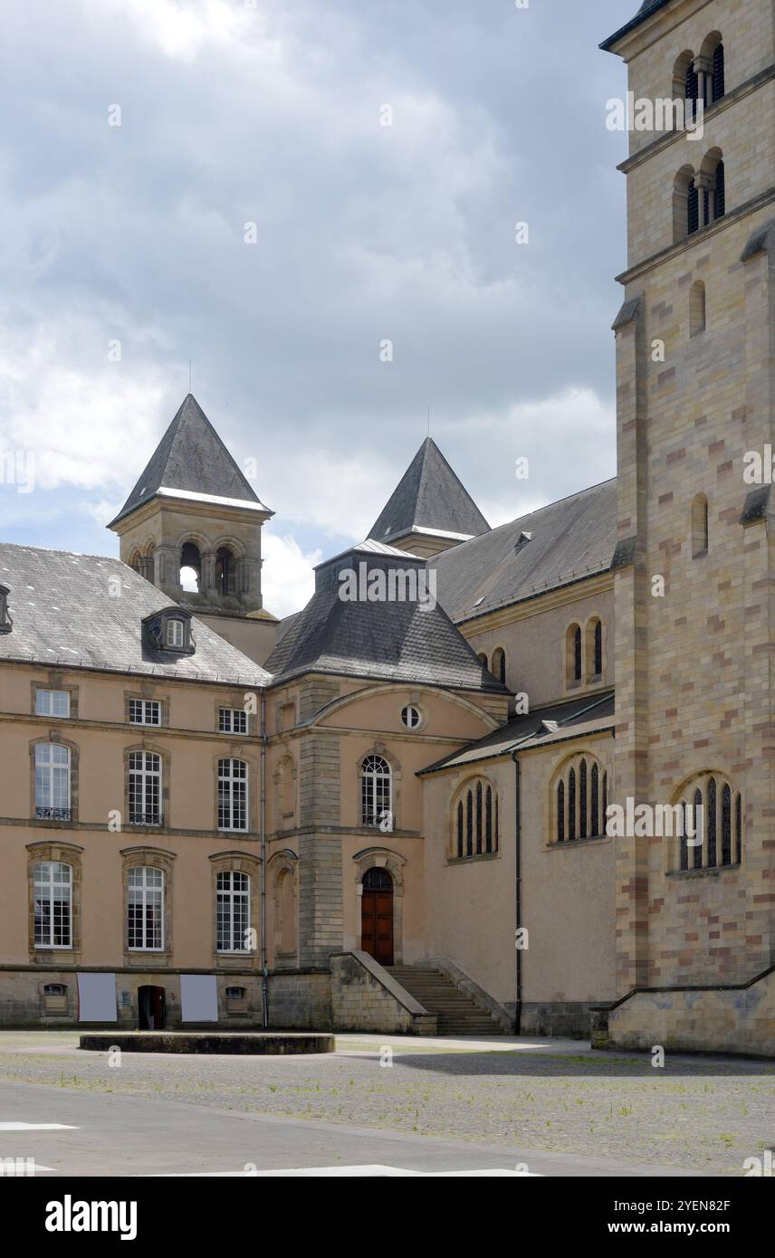 Monastery Yard and Towers of St Willibrordus Cathedral in Echternach, Luxembourg Stock Photo