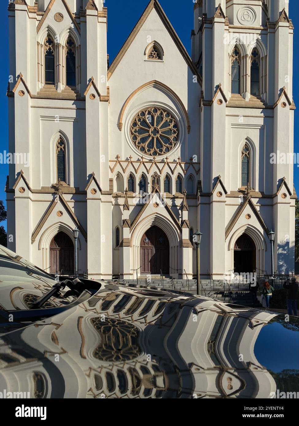 Car Hood with a reflection of the Cathedral Basilica of St. John the Baptist, Savannah, Georgia Stock Photo