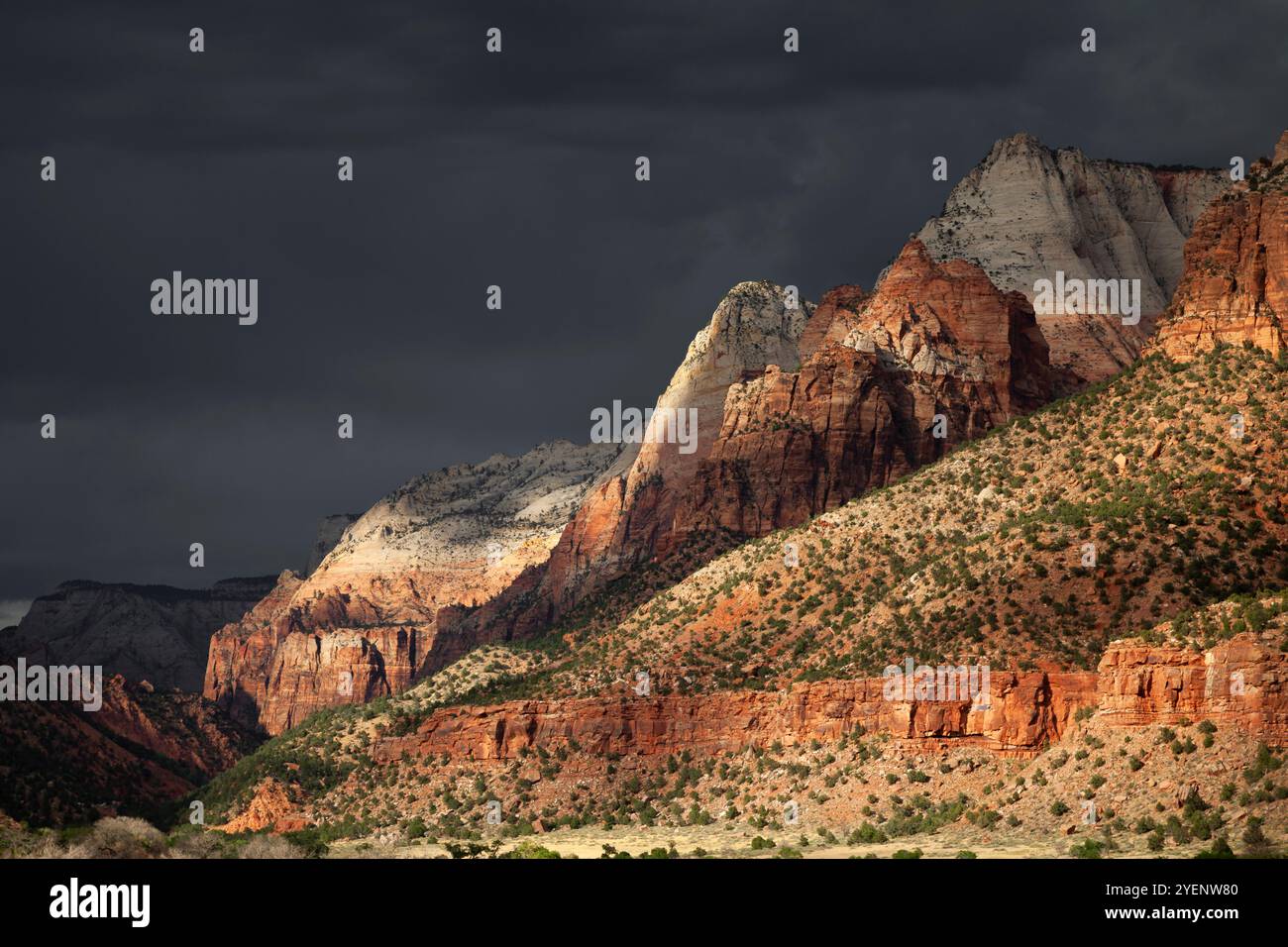 The late afternoon sun highlightsThe East Temple  above the eastern rim of Zion Canyon in Zion National Park Stock Photo