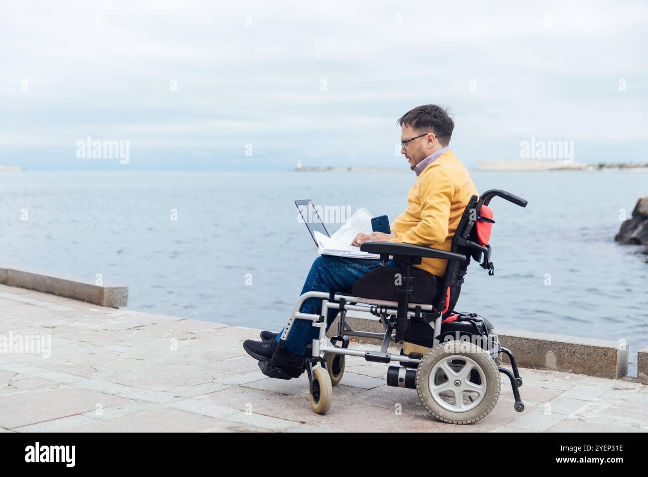 Engineer using wheelchair in hi-res stock photography and images - Alamy
