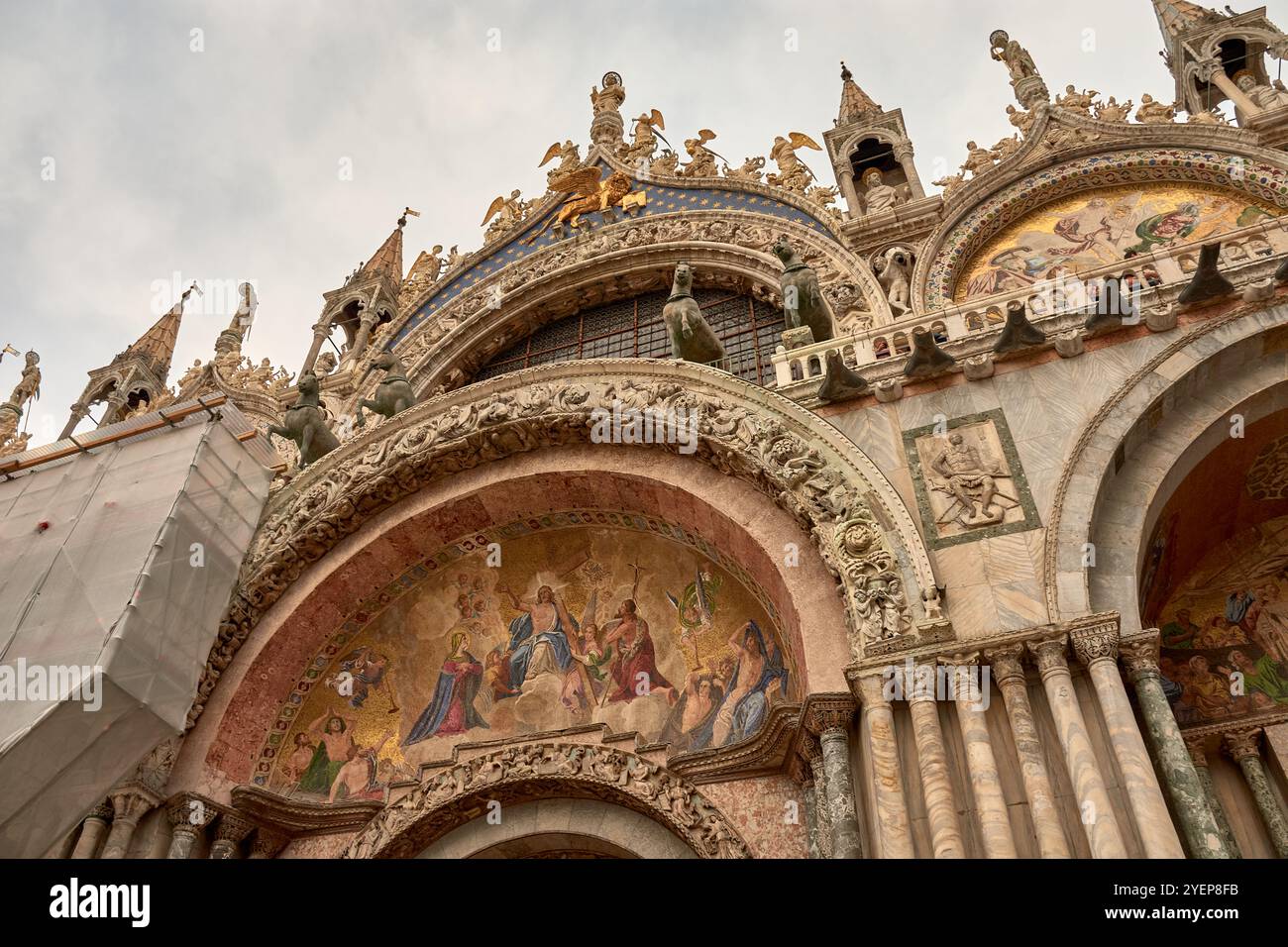 close-up of the ornate facade of St. Mark's Basilica in Venice, Italy ...