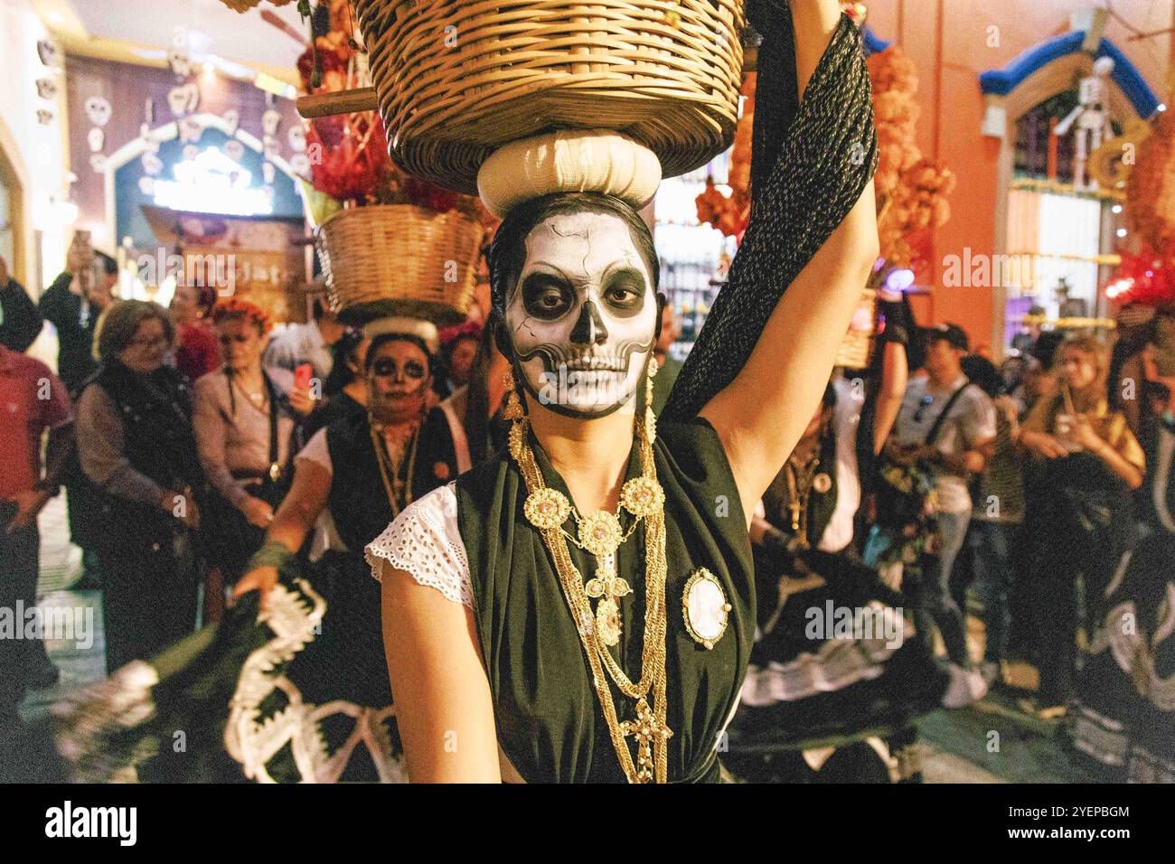Dia de Muertos Parade in Oaxaca A woman wearing a traditional Mexican ...