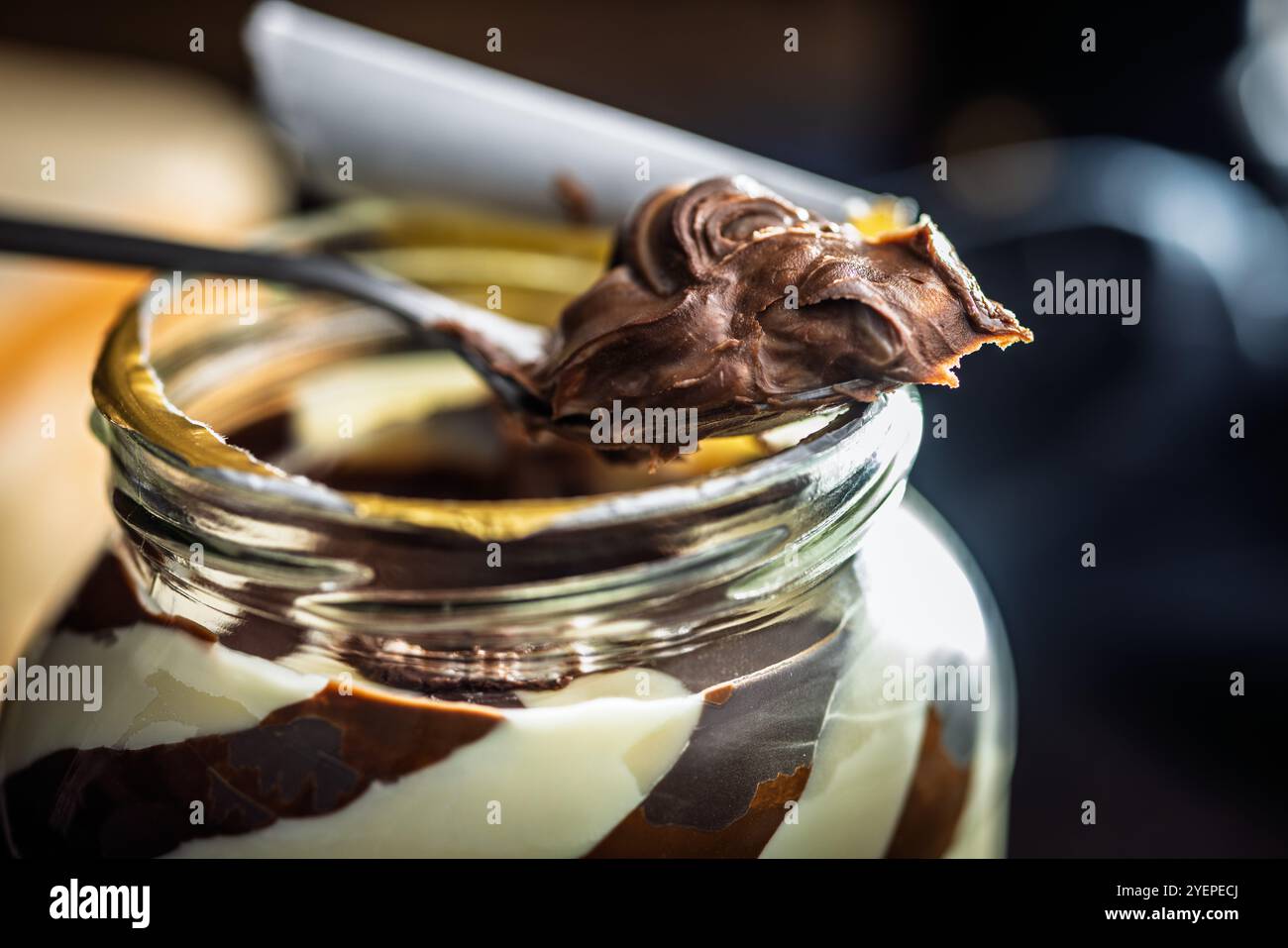 Chocolate cream spread on  a spoon. Stock Photo
