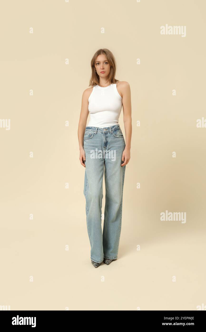 Woman in blue top hi-res stock photography and images - Alamy