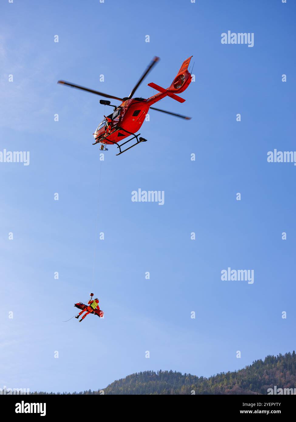 Emergency services helicopter winch hi-res stock photography and images ...