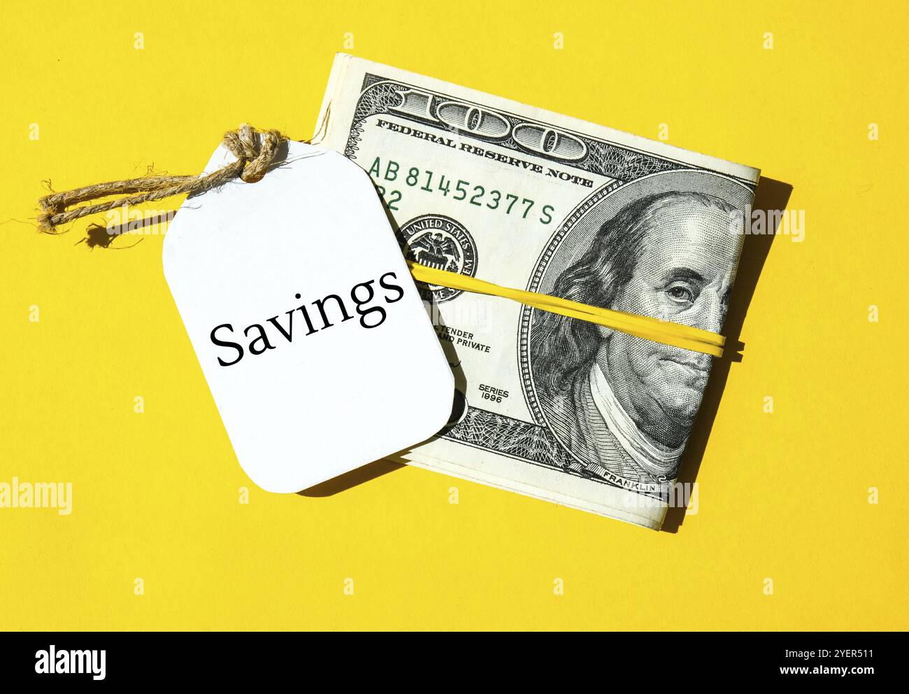 Paper note written text SAVINGS. Save money. Save today for tomorrow ...