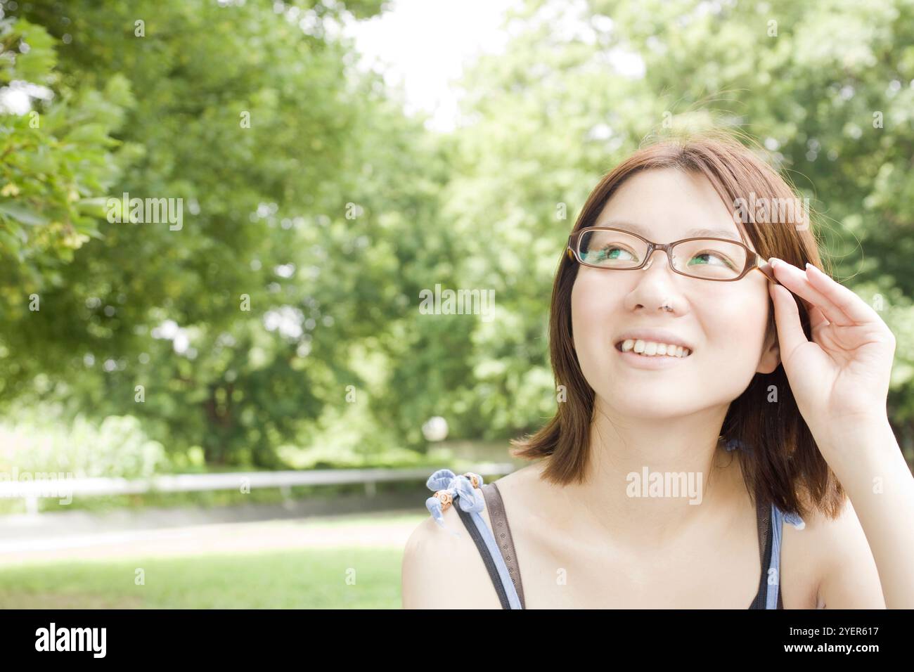 Japanese woman wearing glasses hi-res stock photography and images - Alamy