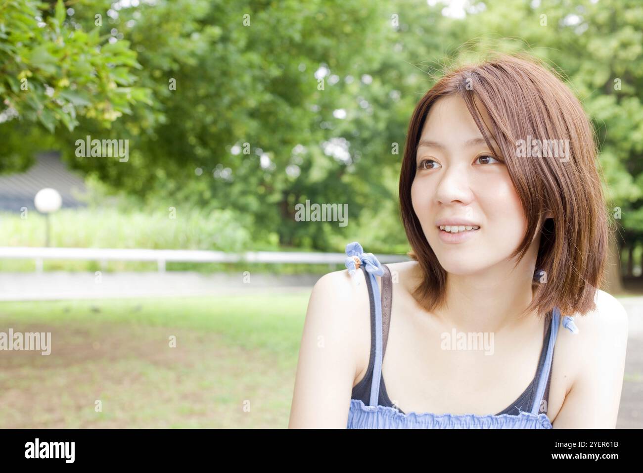 Woman sitting on chair Stock Photo