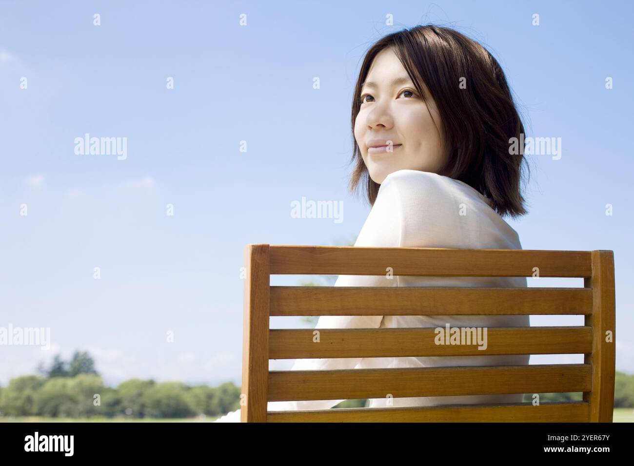 Young japanese woman on chair hi-res stock photography and images - Alamy