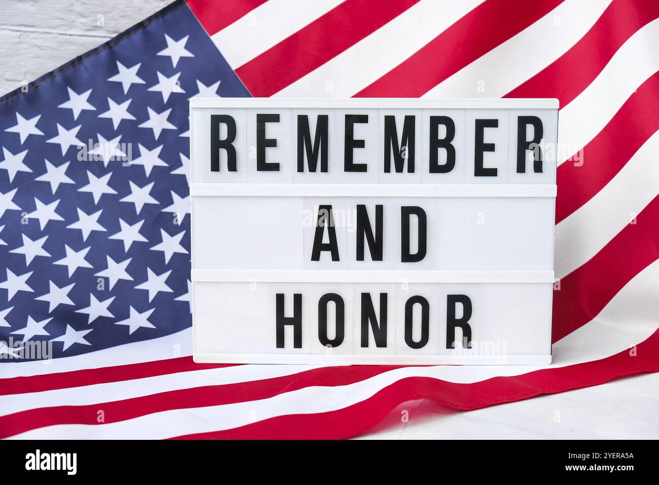 American flag. Lightbox with text REMEMBER AND HONOR Flag of the united states of America. July 4th Independence Day. USA patriotism national holiday. Stock Photo