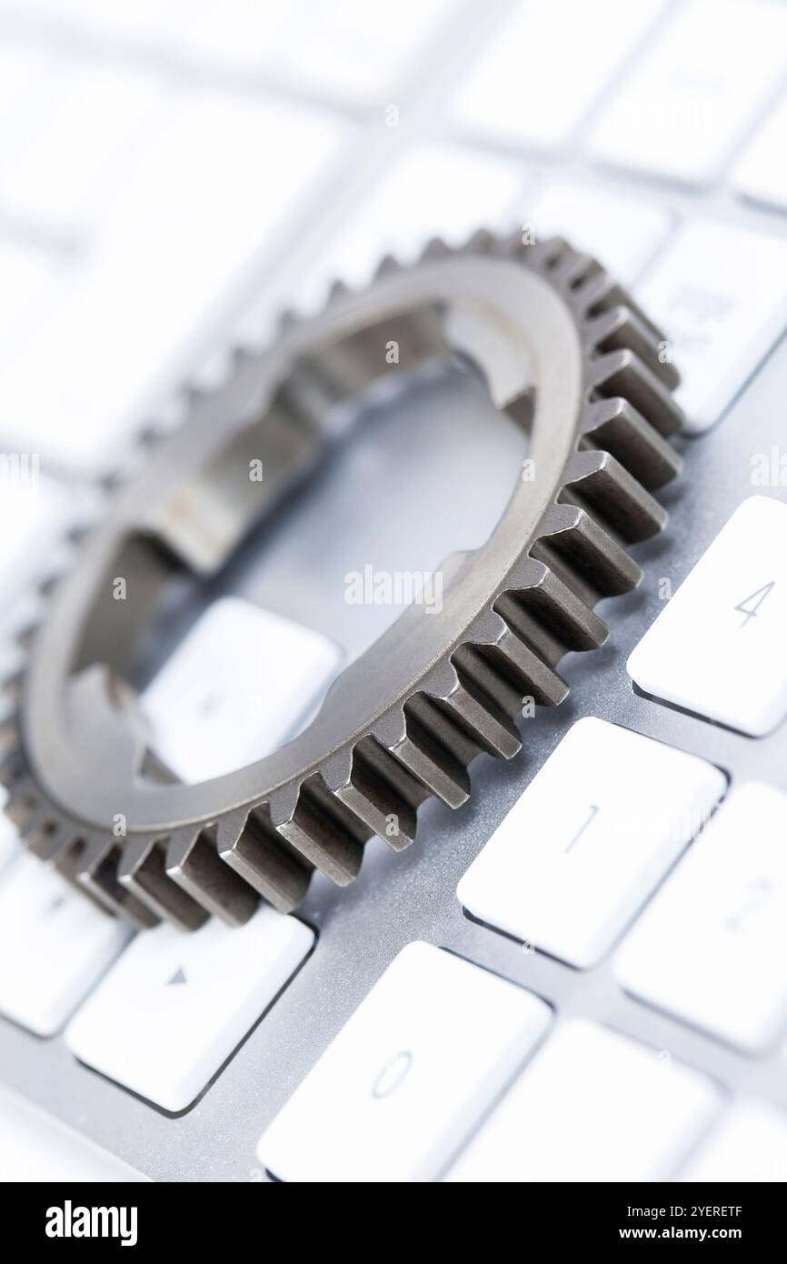 Gear and PC keyboard Stock Photo - Alamy