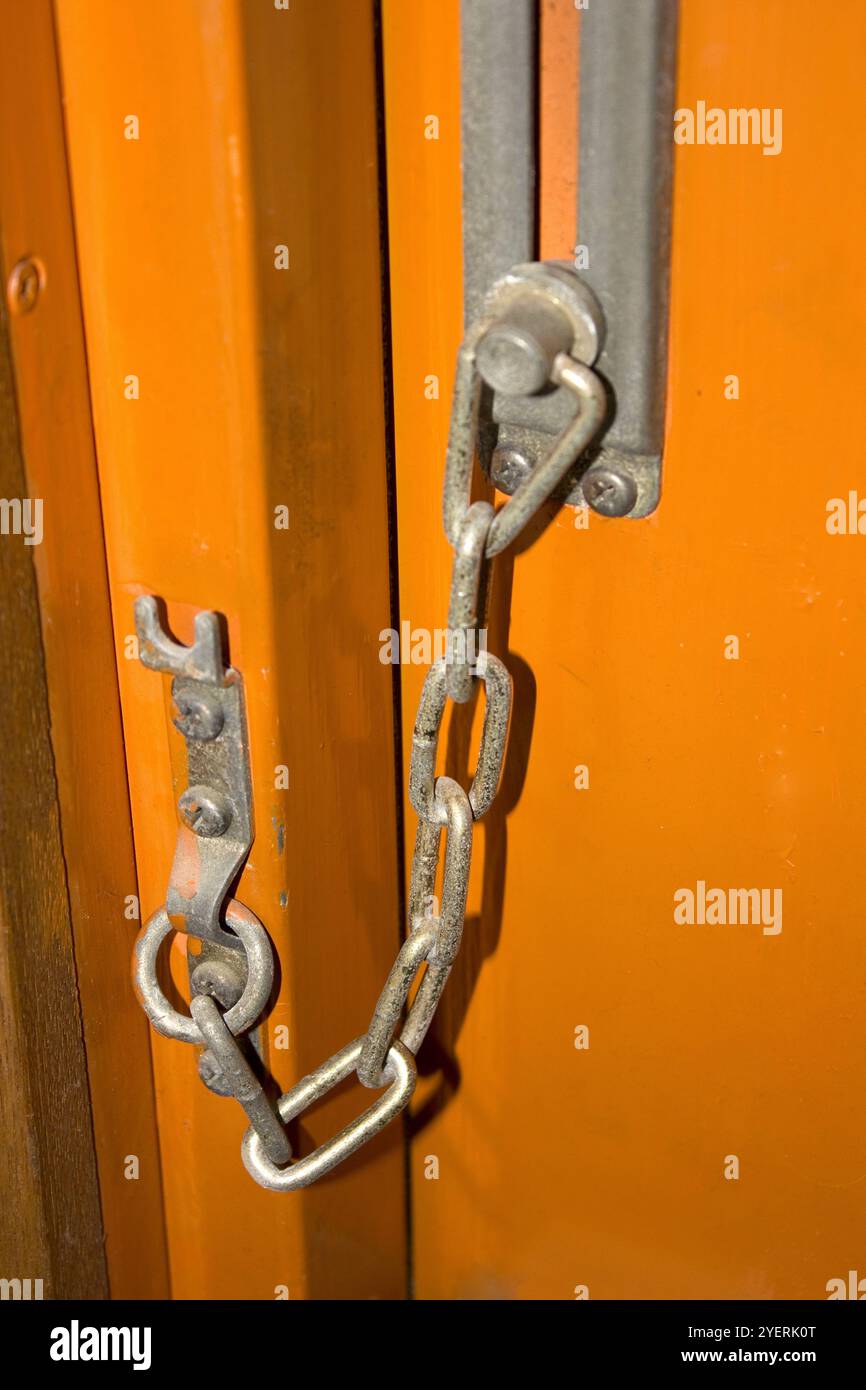 Old flat door chain Stock Photo