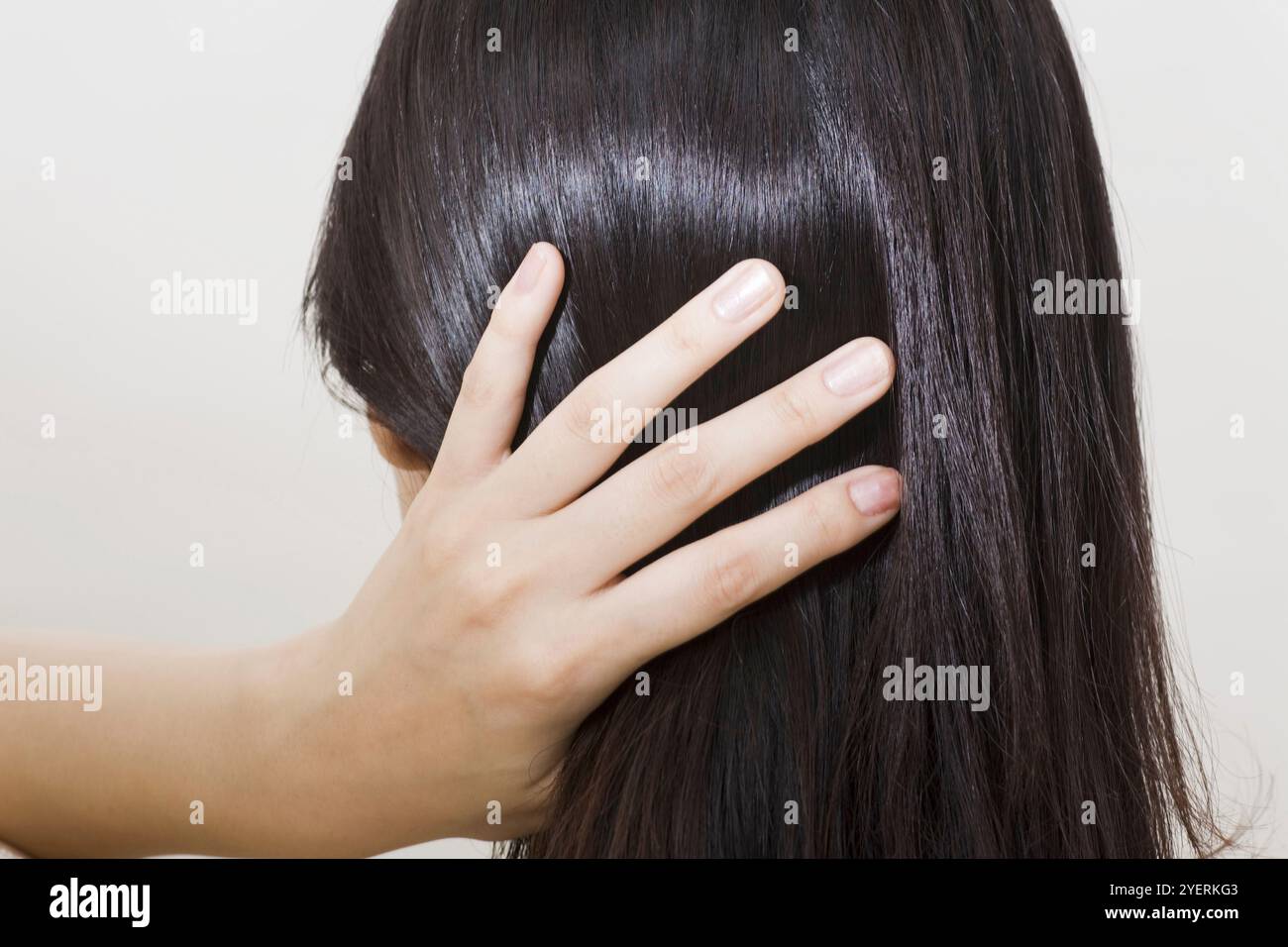 Woman with black hair Stock Photo