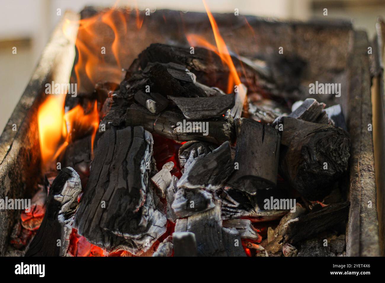 Burning coals in the barbecue. Close up. Stock Photo