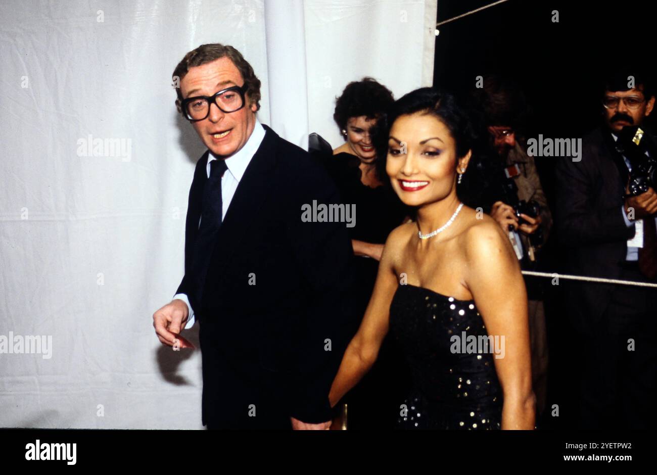 Michael. Caine and Shakira Caine iat an event honoring Queen Elizabeth
