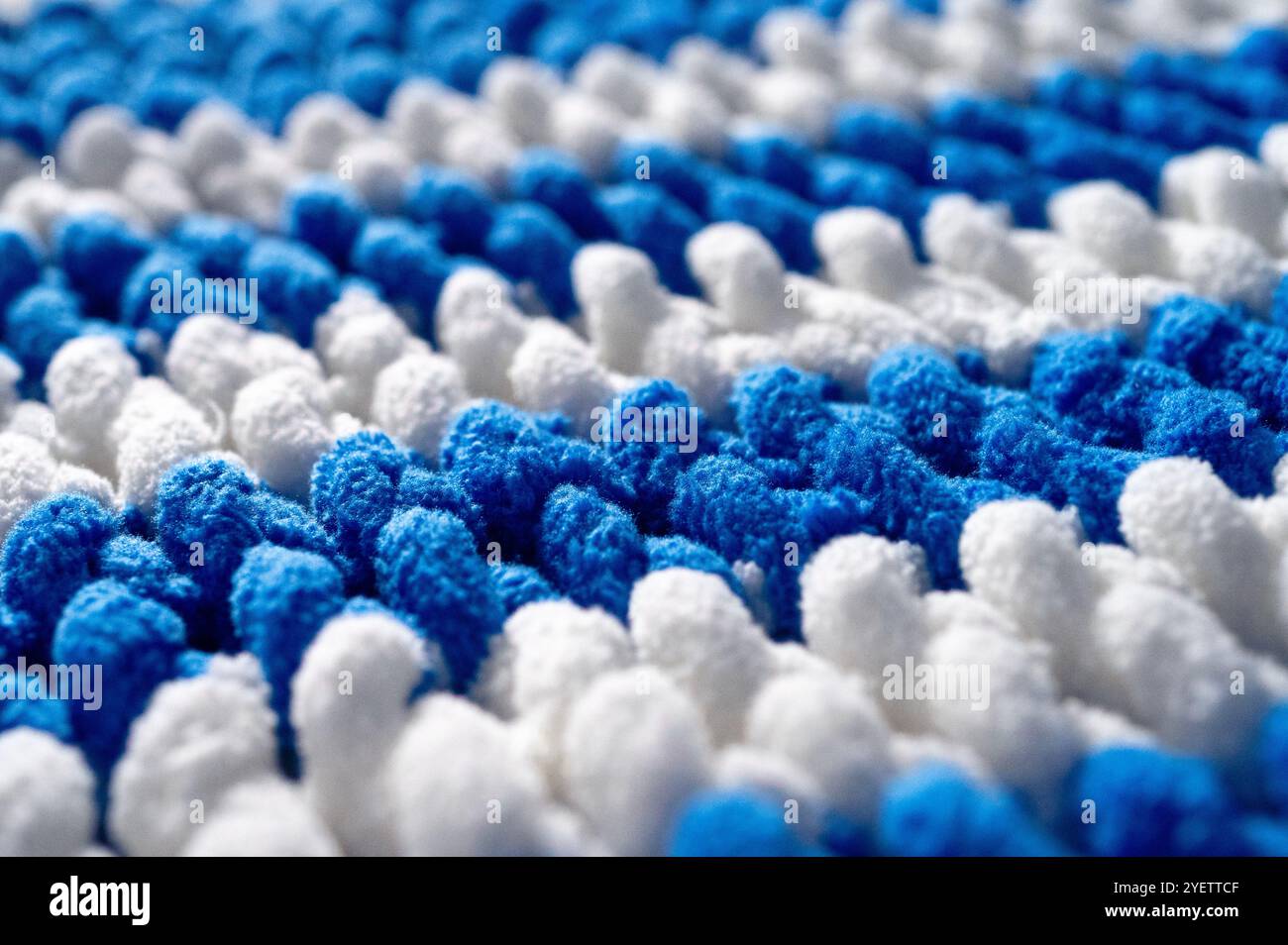 Fleece warm knitted background close-up. Stock Photo