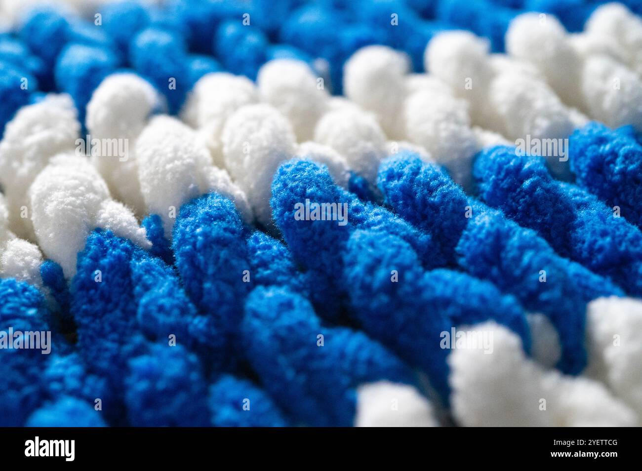 Fleece warm knitted background close-up. Stock Photo