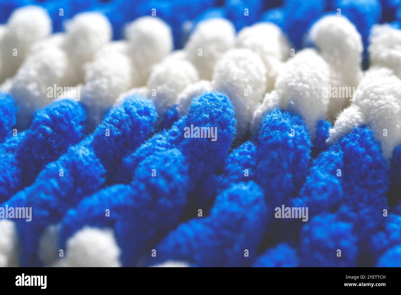 Fleece warm knitted background close-up. Stock Photo