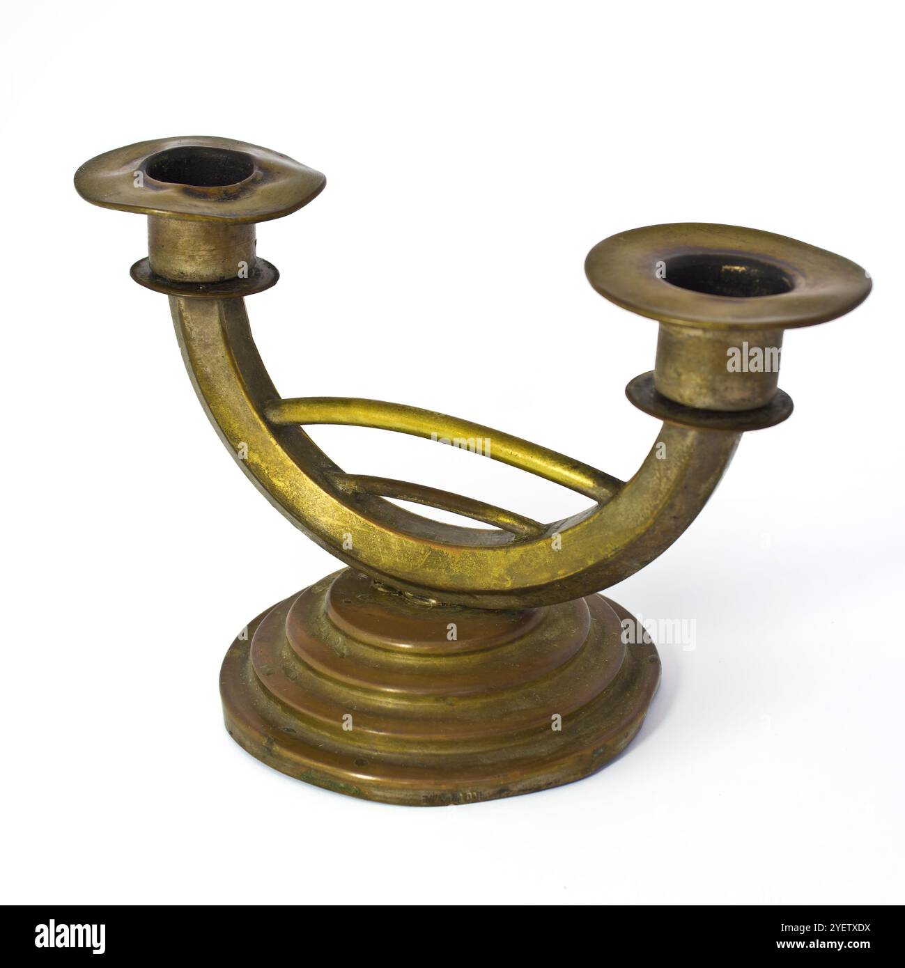 Old copper candlestick in a retro style isolated on a white background Stock Photo