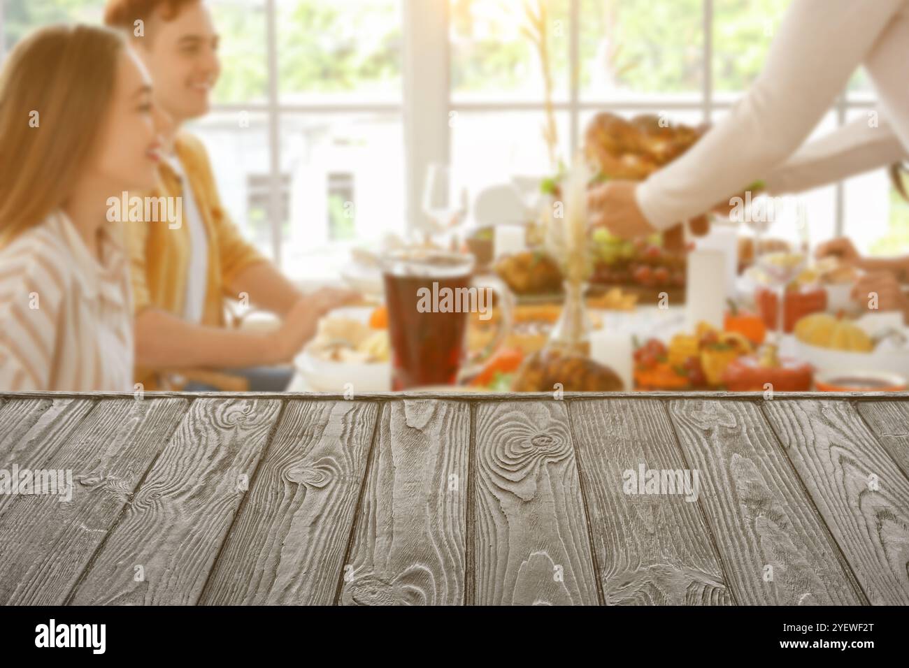Having Table Empty table and friends having dinner on Thanksgiving Day Stock Photo ...