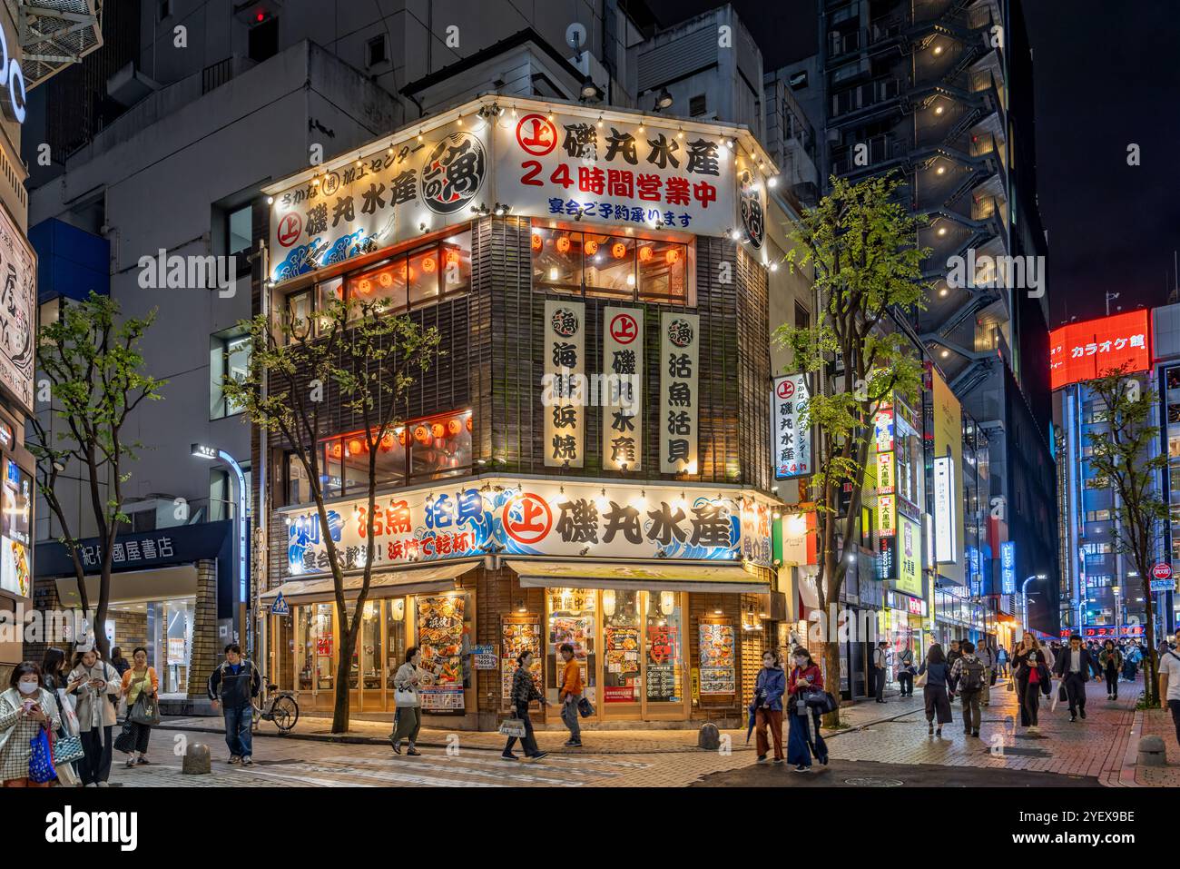 Brightly lit restaurant at night in Shinjuku, Tokyo, Japan on 9 October 2024 Stock Photo