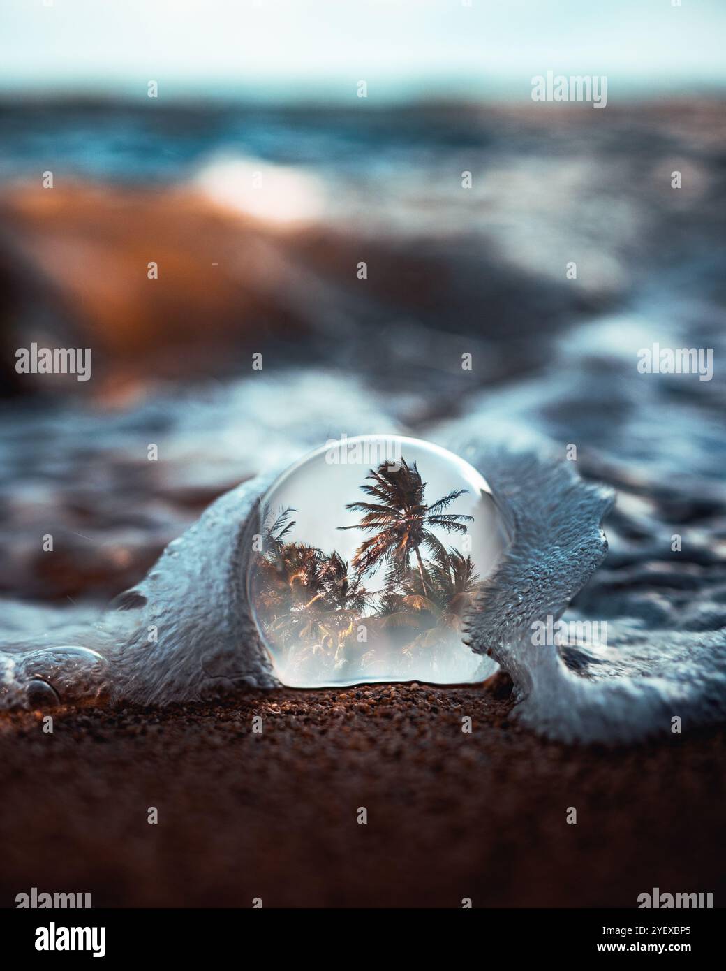 A Crystal Ball On The Shore Of A Sandy Beach With A Mini Wave Covering ...