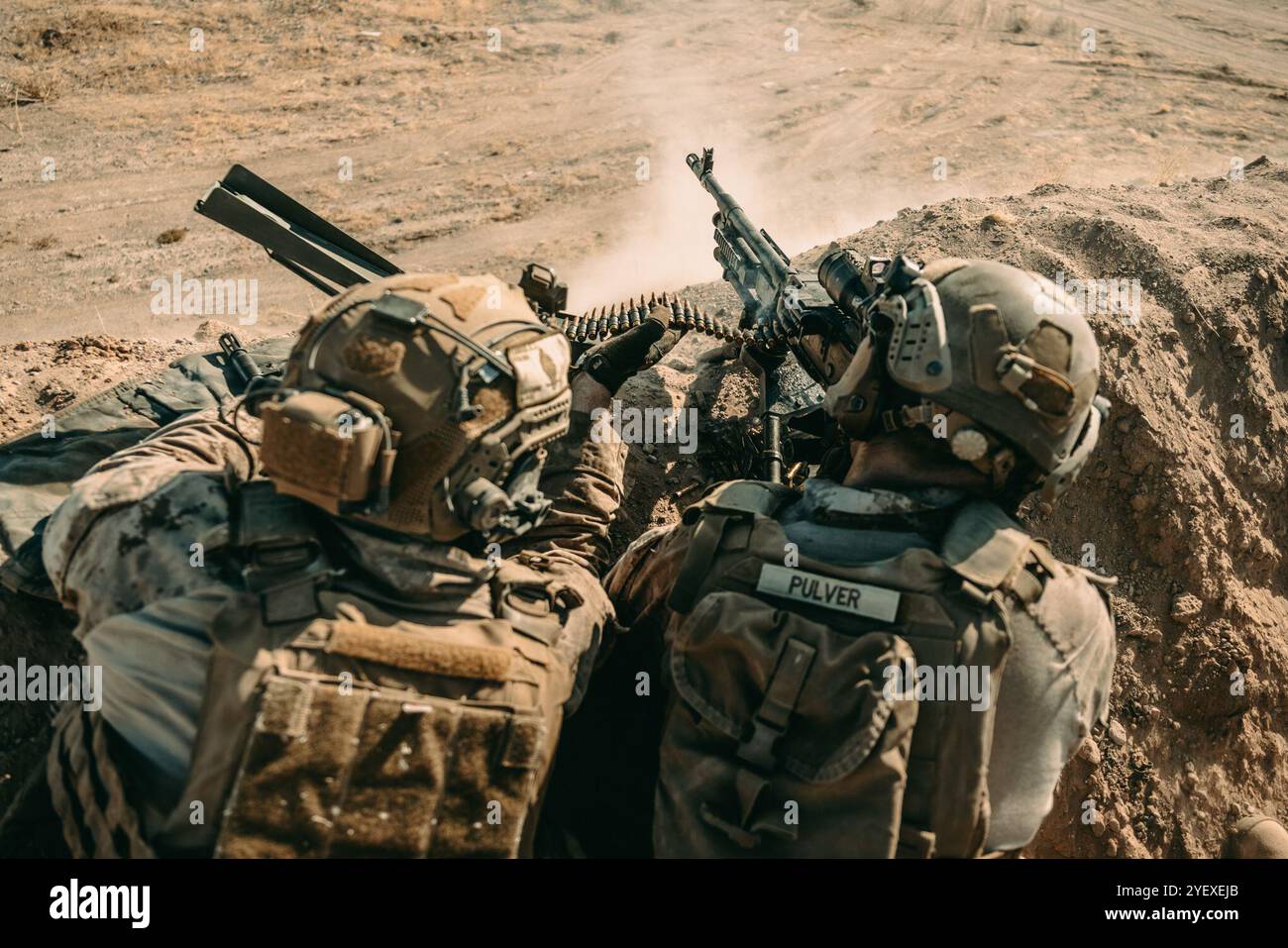 U.S. Marine Corps Cpl. Gavin Pulver, right, an anti-tank missile gunner ...