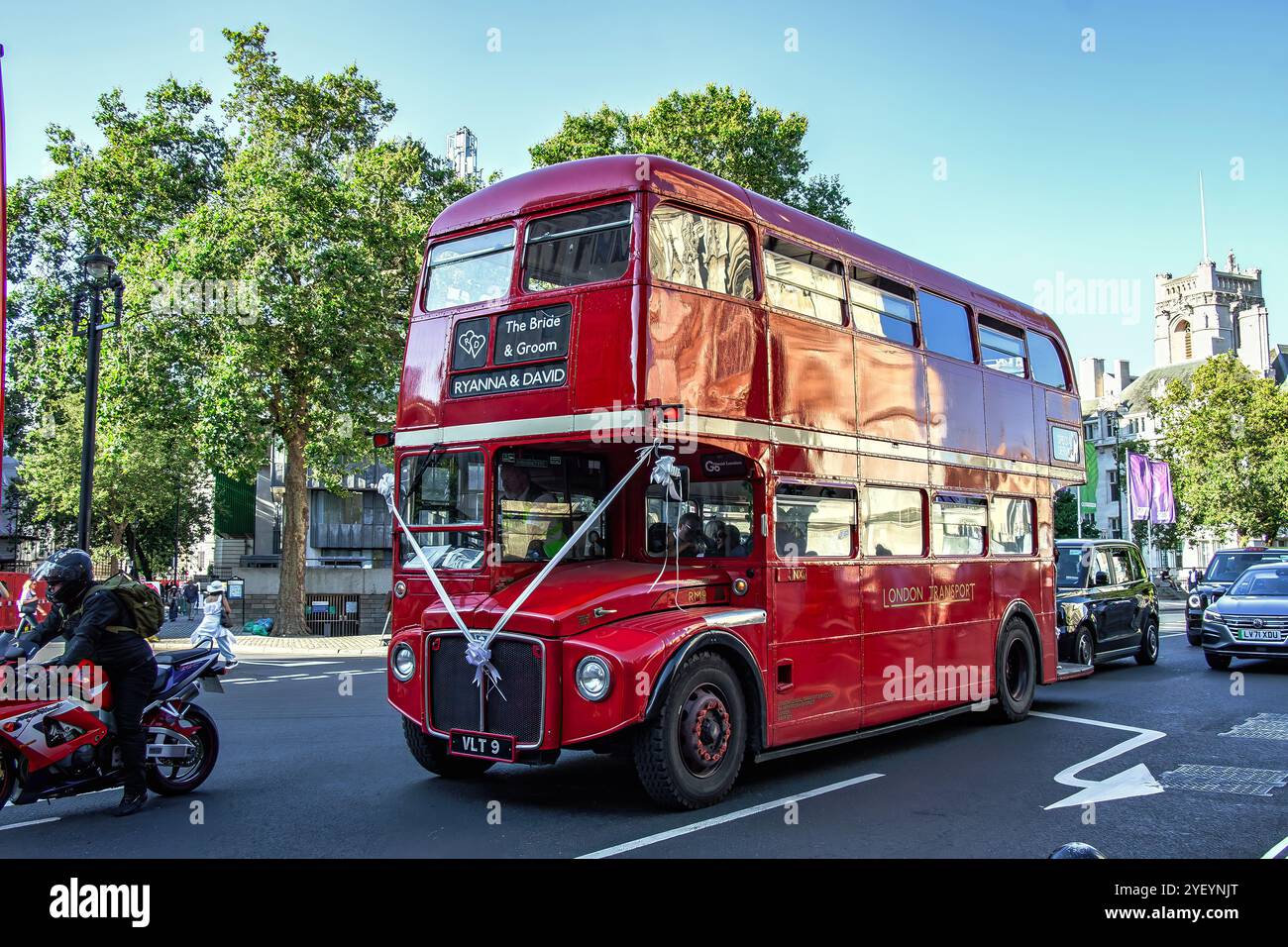 The typical red double decker routemaster historic bus on the streets