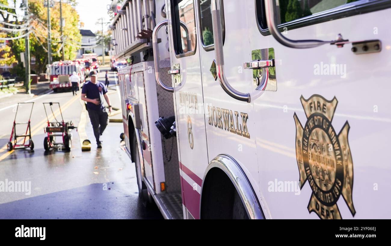 Yellow fire hose on firetruck hi-res stock photography and images - Alamy