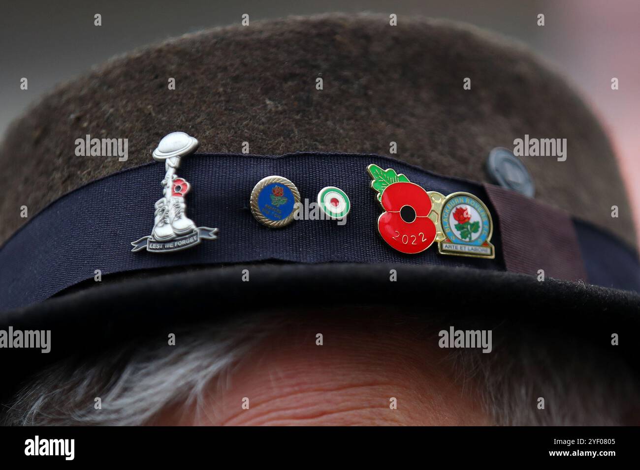 A detailed view of pin badges on a Blackburn Rovers supporters hat ahead of the Sky Bet Championship match at Ewood Park, Blackburn. Picture date: Saturday November 2, 2024. Stock Photo