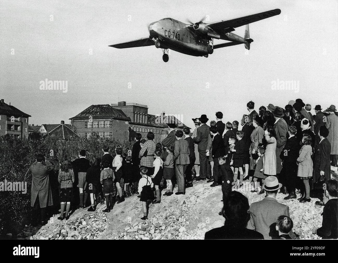 Crowds Watch As A Fairchild C 82 Packet Approaches To Land At Templehof 