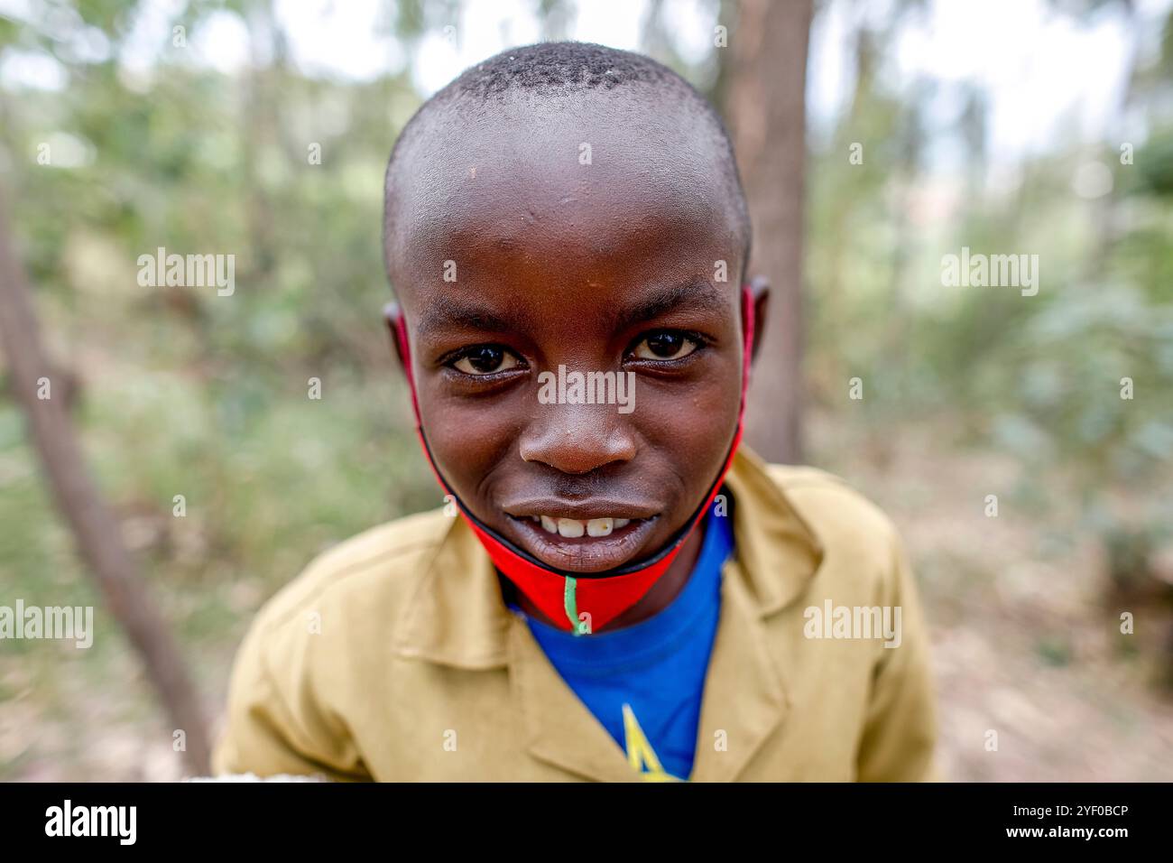 Boy standing in a forest in southern Rwanda Stock Photo - Alamy