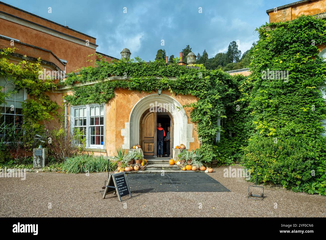 Ivy clad entrance to Killerton House, near Exeter, Devon, UK on 20 October 2024 Stock Photo