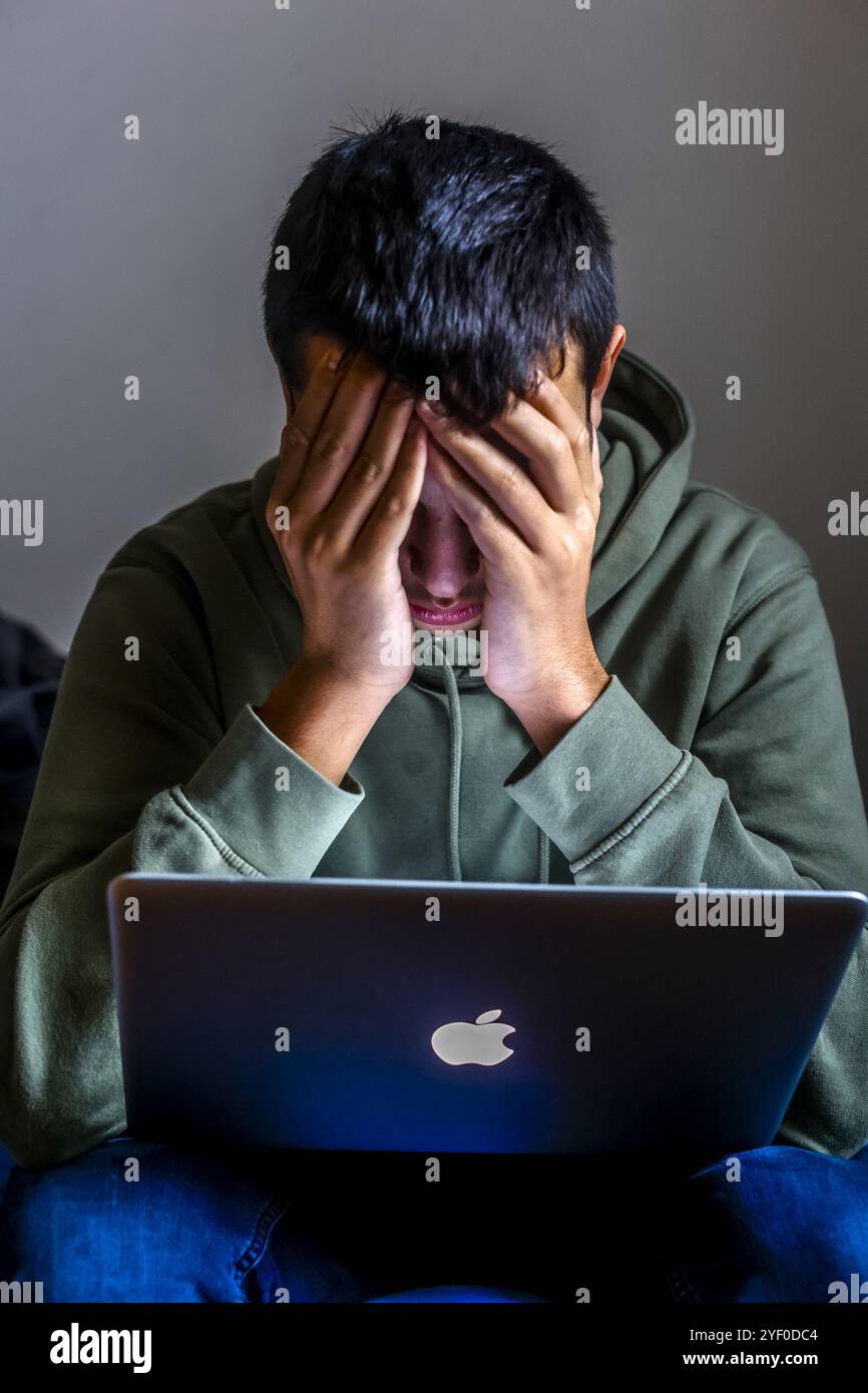 Surprised teenager sitting on hi-res stock photography and images - Alamy