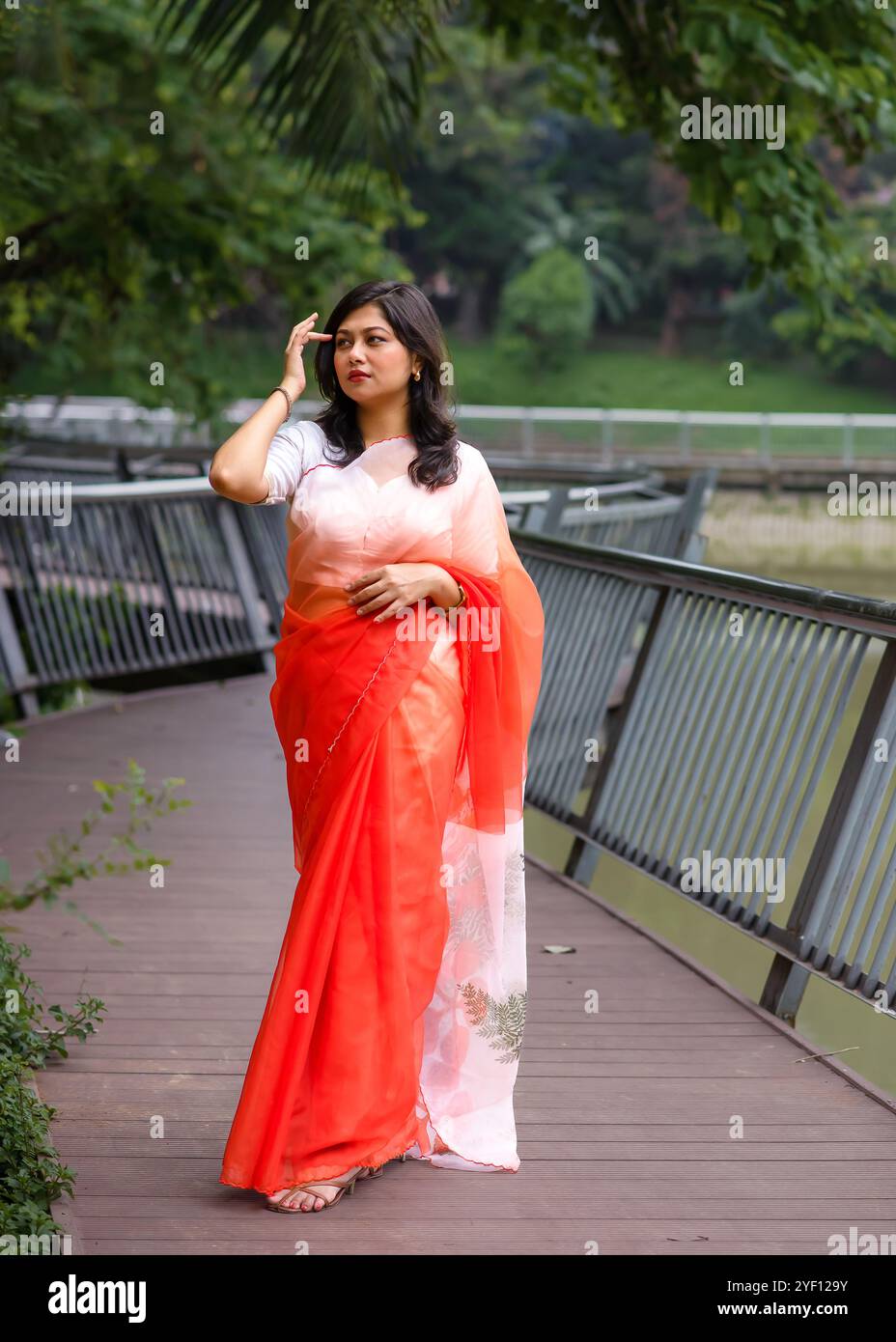 Indian girl wearing saree hi-res stock photography and images - Alamy