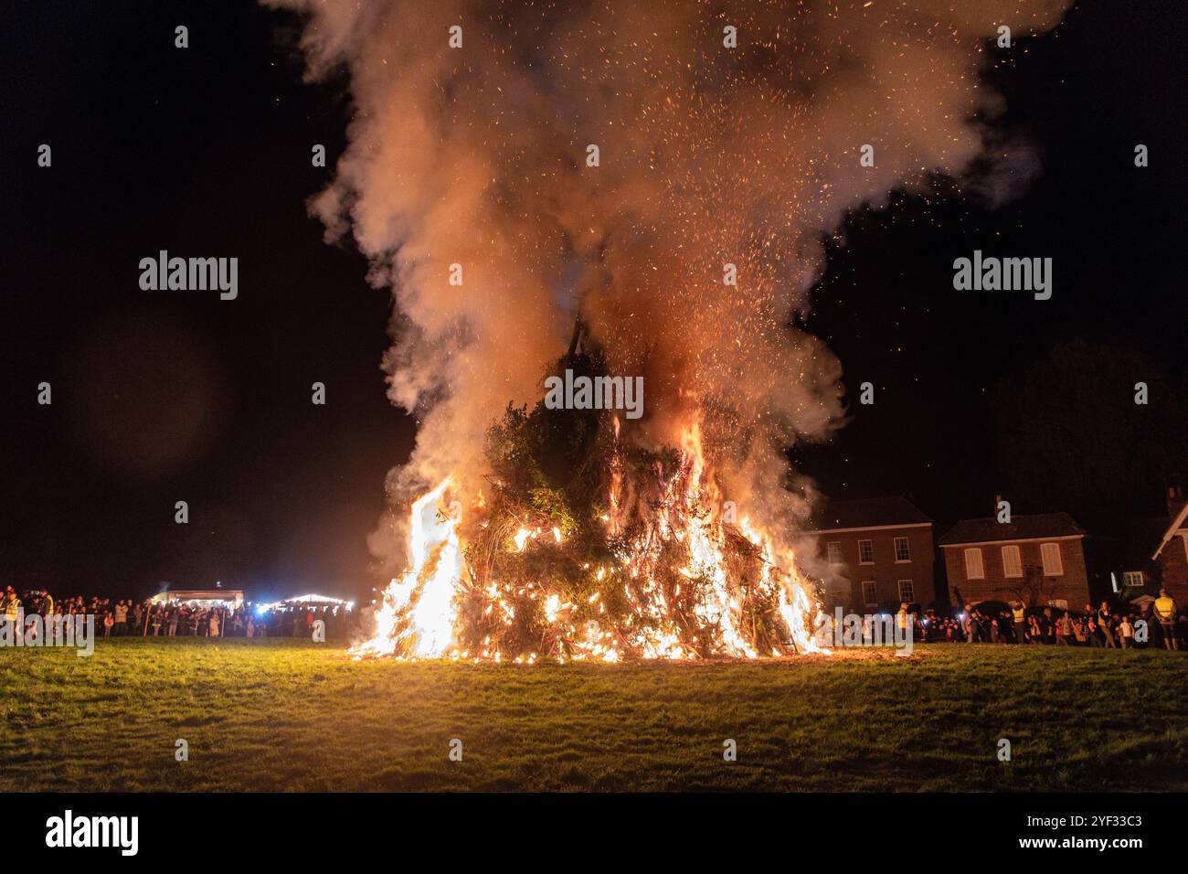 November 2nd, 2024. The annual bonfire night celebrations took place tonight at Chiddingfold village in Surrey, England, UK. The popular event included a torch procession, a traditional bonfire with Guy Fawkes on top, and an impressive fireworks display. Stock Photo