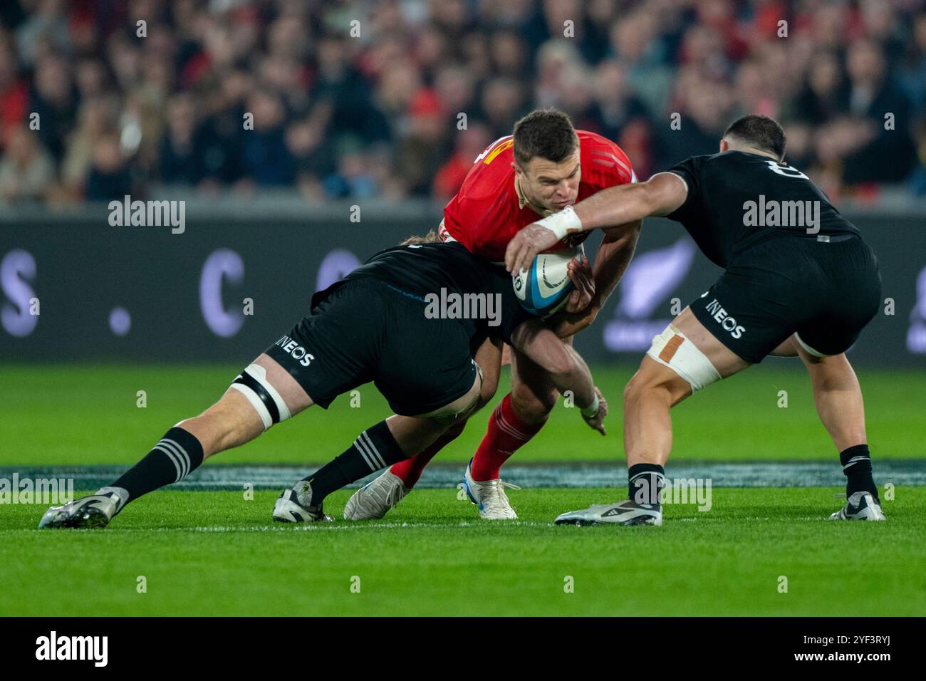 Limerick, Ireland. 03rd Nov, 2024. Tom Farrell of Munster tackled by ...