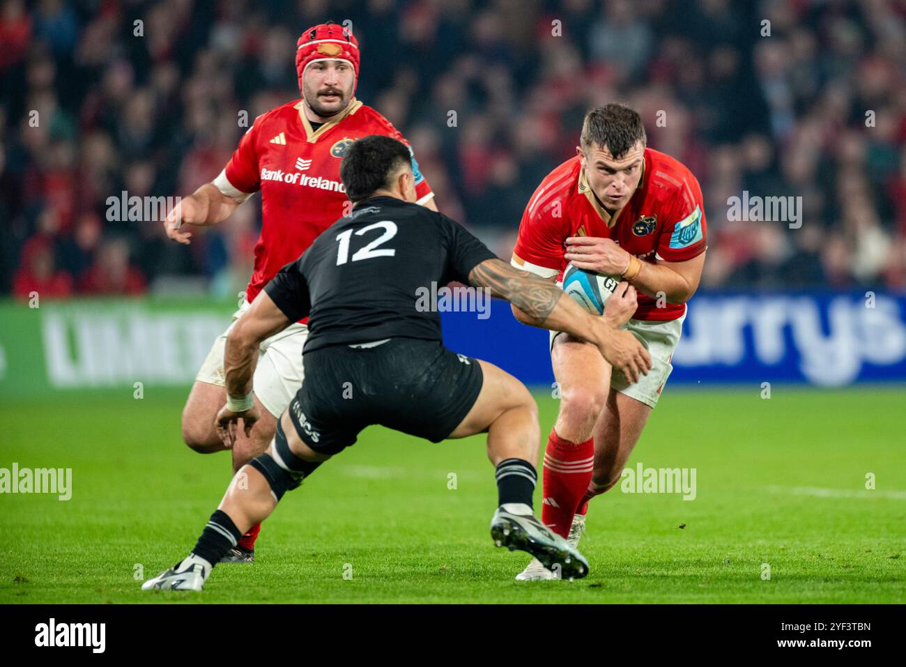 Limerick, Ireland. 03rd Nov, 2024. Tom Farrell of Munster tackled by ...