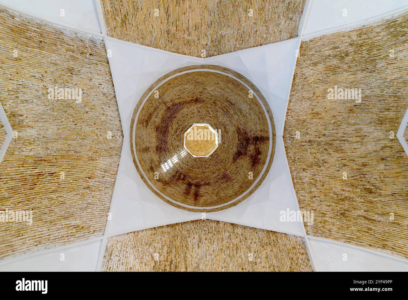 Low-angle view of the dome inside the Taki Telpak Furushon bazaar. Bukhara, Uzbekistan. Stock Photo