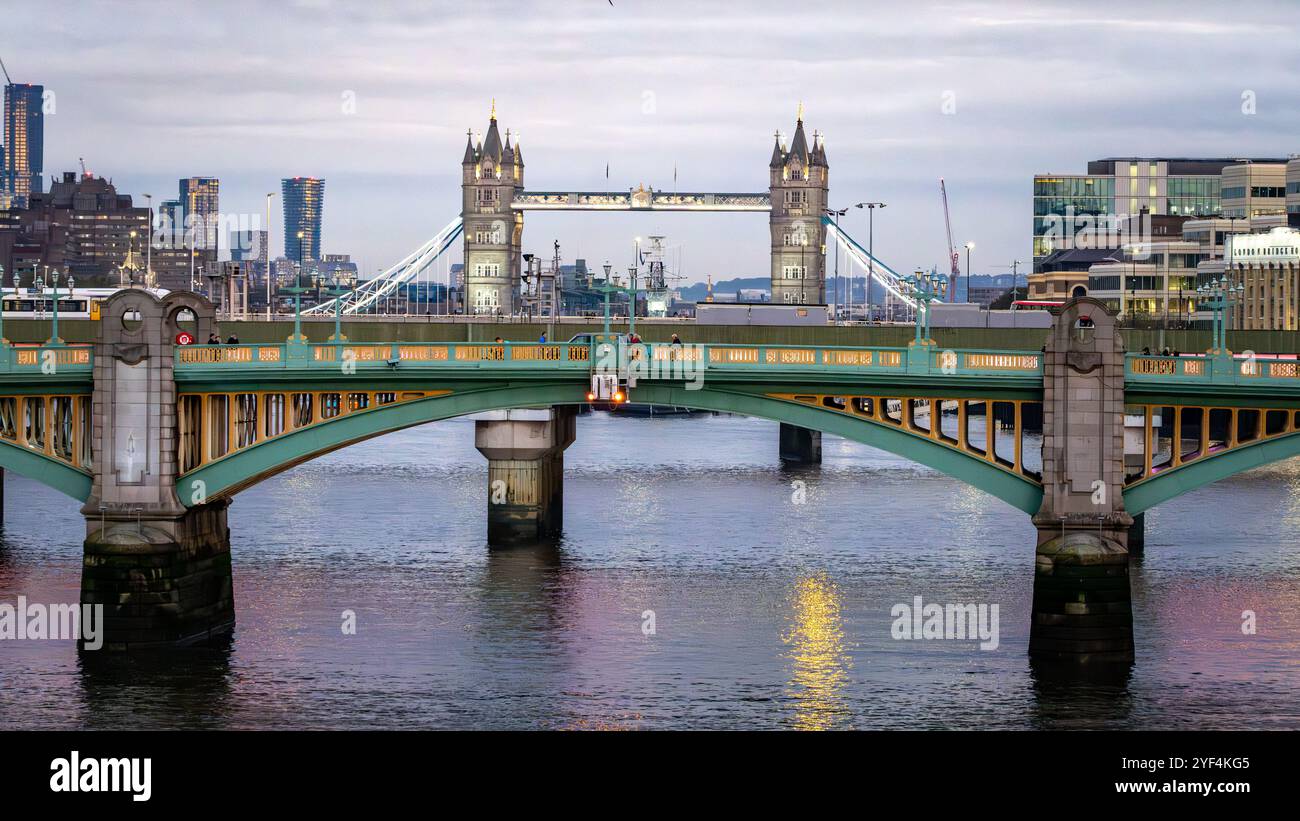 Southwark Bridge with Tower Bridge Behind, from Millennium Bridge, Central London, UK Stock Photo