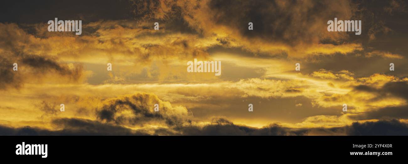 Netural Rising Time Background Panorama dramatic clouds illuminated rising of sun in sky to change ...