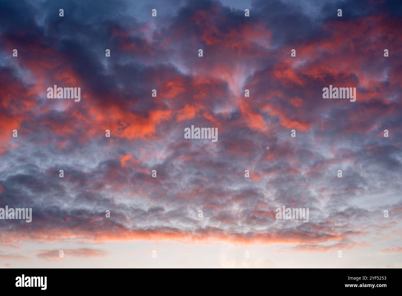 October dramatic colorful sunset cloudy sky Stock Photo