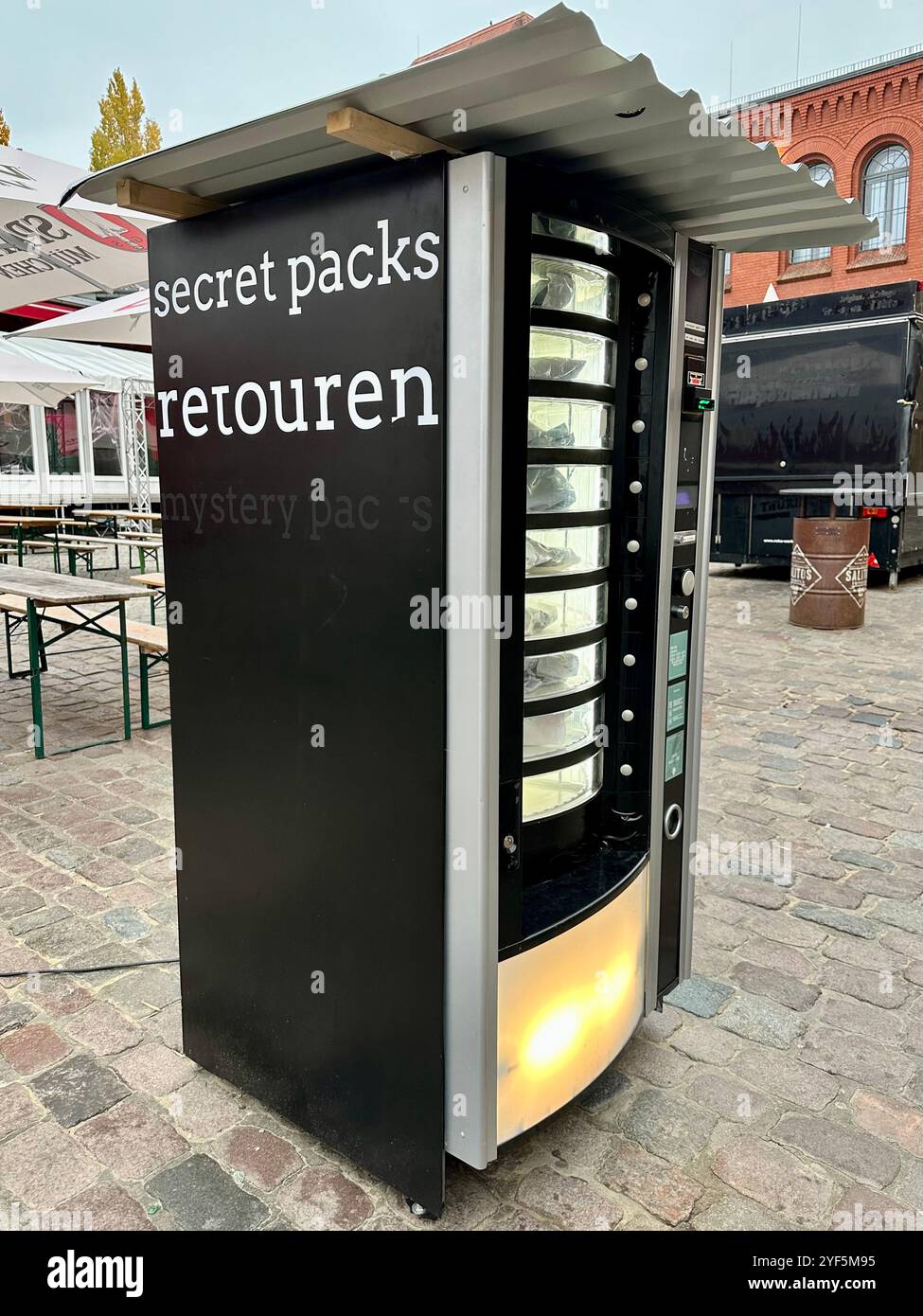 Vending machine for random undelivered or returned parcels, called secret packs, in Berlin, Germany - Smartphone Captured Stock Image