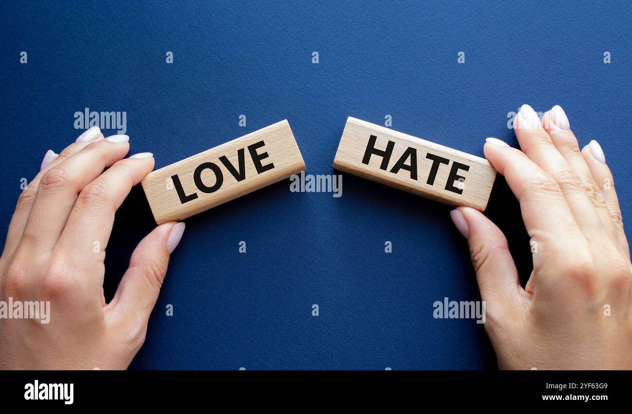 Love vs Hate symbol. Concept word Love vs Hate on wooden blocks ...