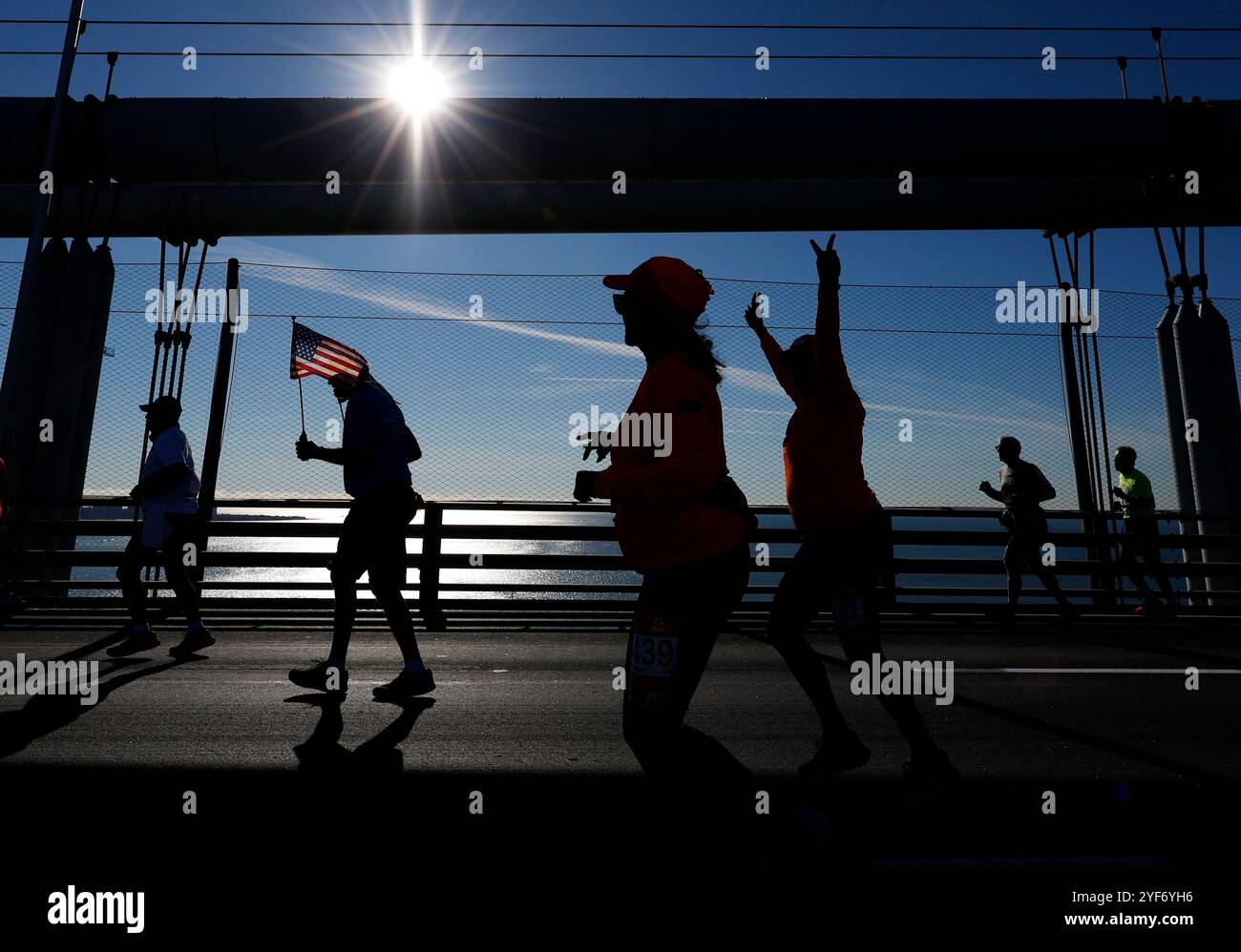 New York, United States. 03rd Nov, 2024. Runners cross over the span of Verrazzano Narrows Bridge when they compete in the 2024 NYRR TCS New York City Marathon in New York City on Sunday, November 3, 2024. Over 50,000 runners from New York City and around the world race through the five boroughs on a course that winds its way from the Verrazano Bridge before crossing the finish line by Tavern on the Green in Central Park. Photo by John Angelillo/UPI Credit: UPI/Alamy Live News Stock Photo