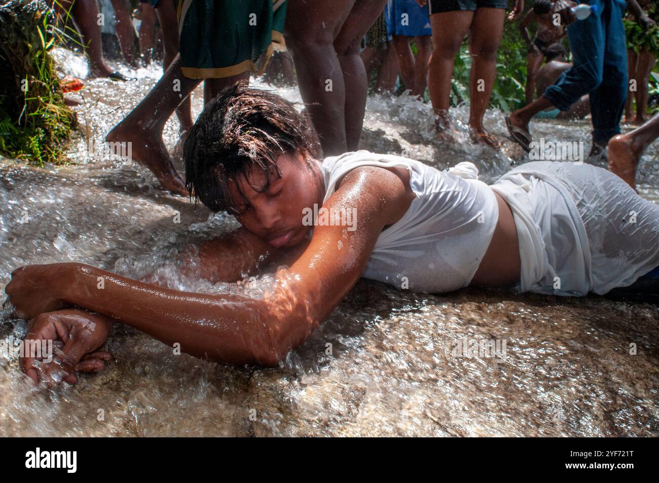 Haiti Voodoo Festival in Saut d'Eau, in Saut d'Eau, Ville Bonheur, Haiti. Thousands of both Vodou and Catholic followers gathered under the Saut d'Eau Stock Photo