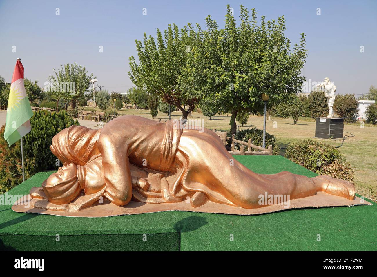 Sculpture of the man and baby victims of Saddam Husseins gas attack at Halabja in Iraq Stock Photo