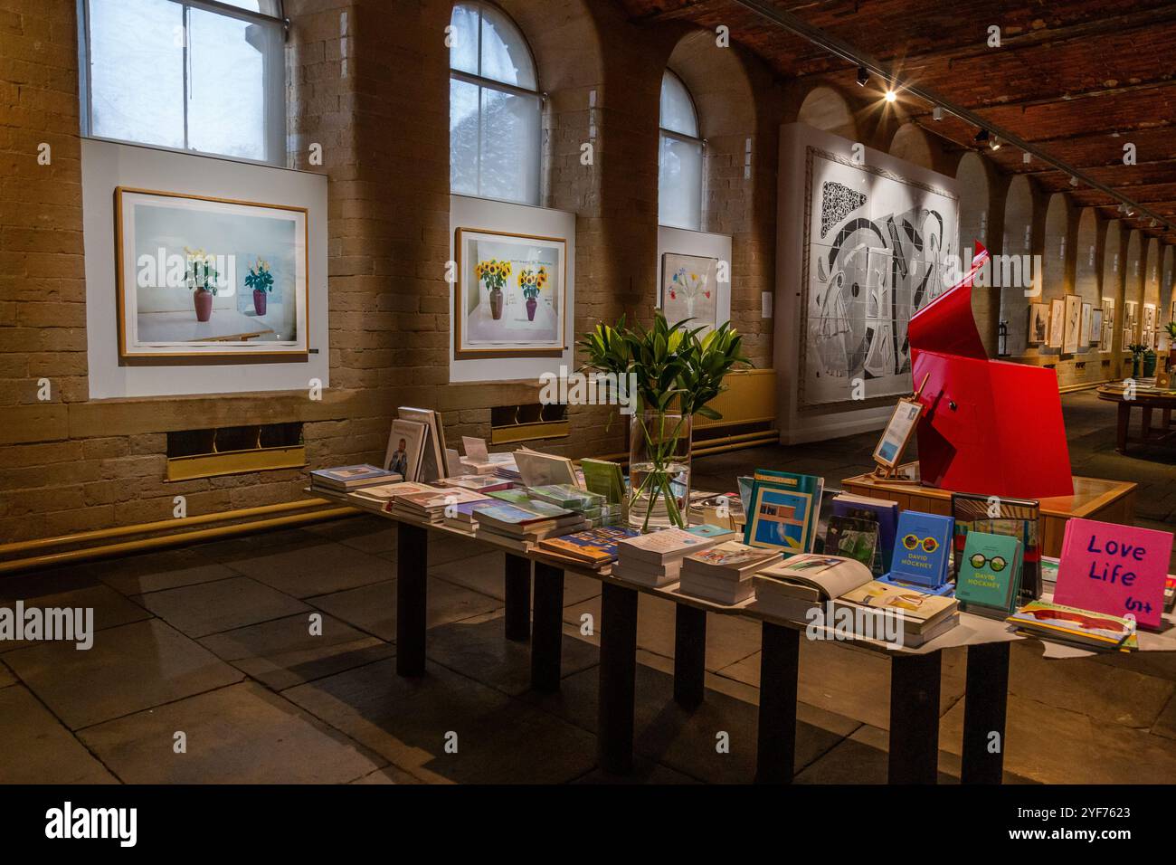 The interior of Salts Mill in Saltaire, Yorkshire. The converted textile mill is the home of David Hockney art. Hockneys artwork is on display. Stock Photo