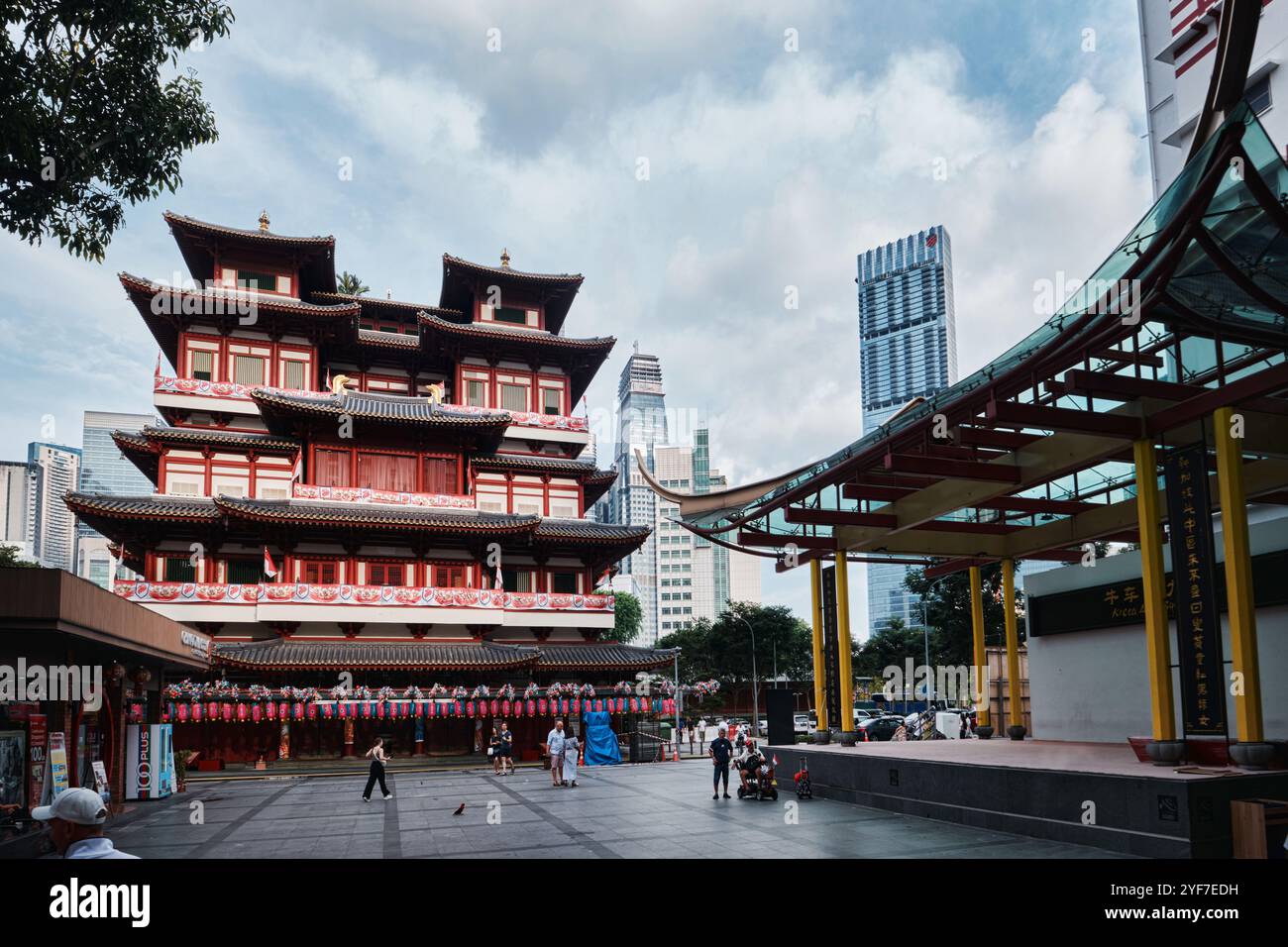 Singapore - August 16, 2024: Buddha Tooth Relic Temple, Chinatown, ornate gold interior, religious cultural landmark destination Stock Photo