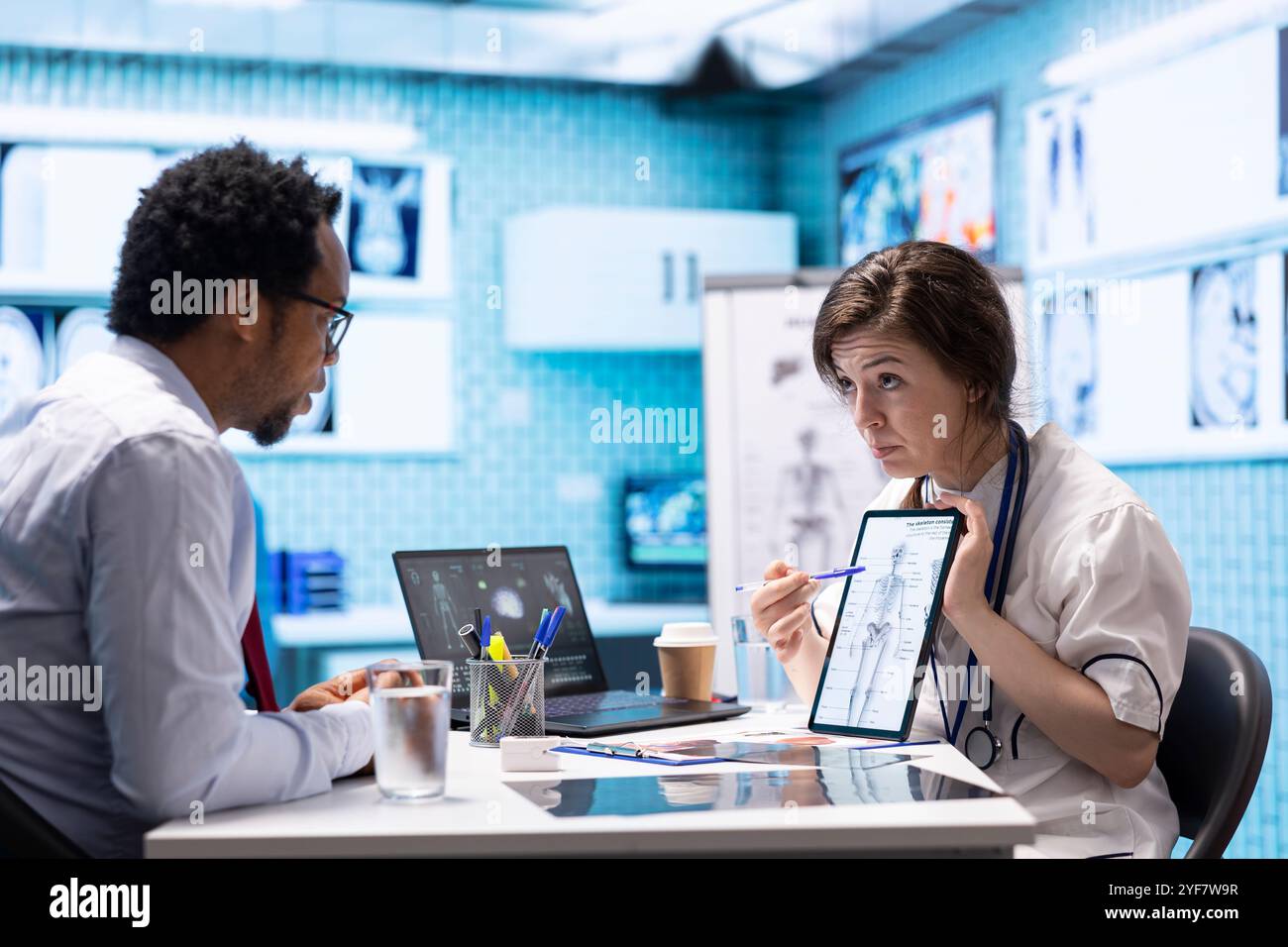 Doctor and patient interaction in a medical consultation room ...